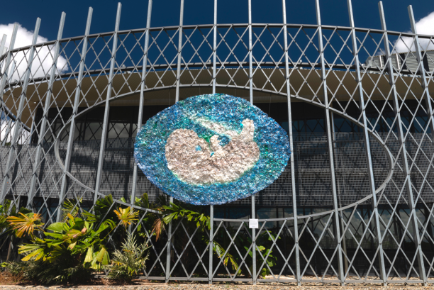 Artwork depicting a fetus made of plastic bottles