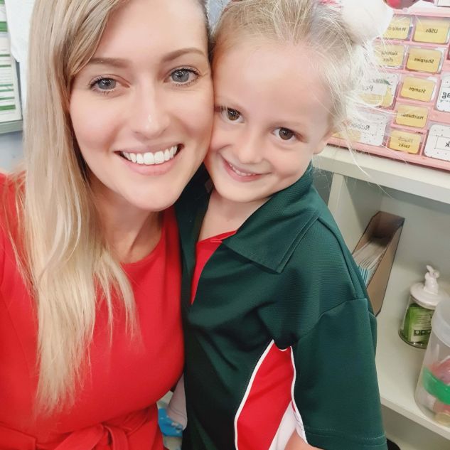 Portrait of Sarah and one of her students 