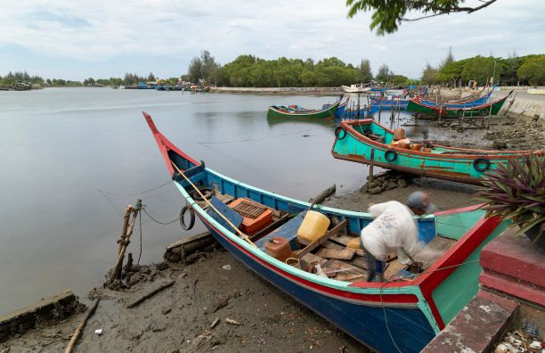 A fisherman in Indonesia using traditional techniques