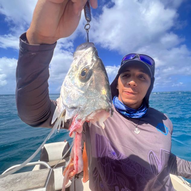 Michael fishing out on the boat