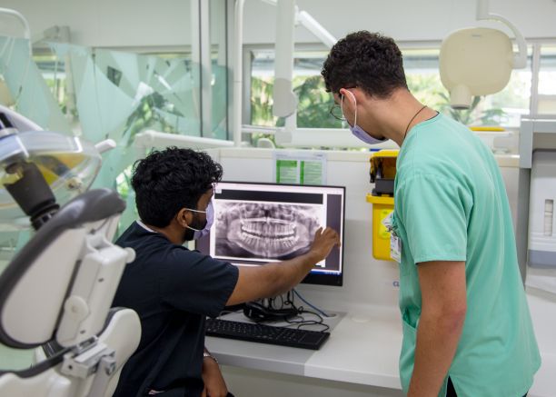 Dr Pabbati and fourth-year JCU Dentistry student, Michael.