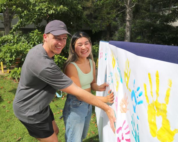 Students at the Hand-n-Hand peer support program launch