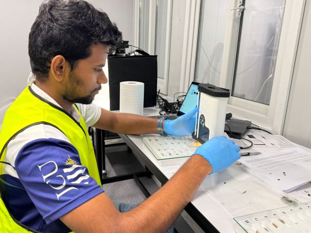 JCU student Kishor working in the lab. 