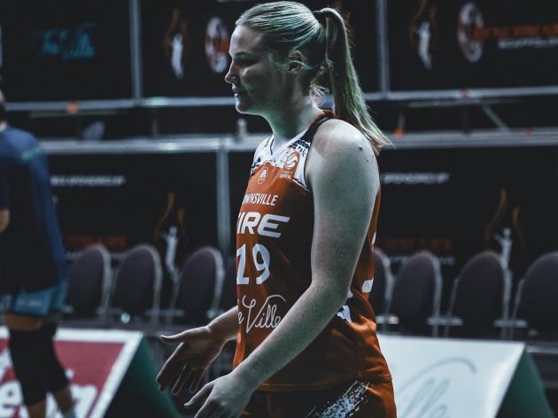 Majella Carey on the court when at the Townsville Fire basketball team.