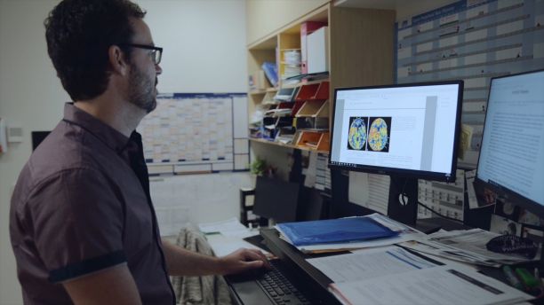 Dr Stevie Perks conducting research