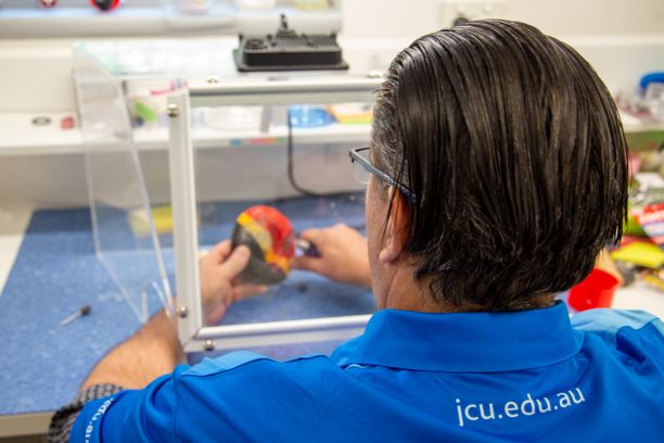 Technician Stephan preparing a mouthguard