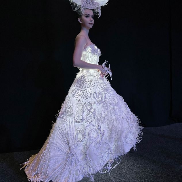 Model wearing the Too Hot to Handle Reef Diss-Dress piece by Robyn Glade-Wright at the POSE wearable art event in Townsville. 