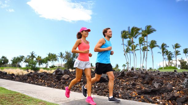 Couple run in the tropics