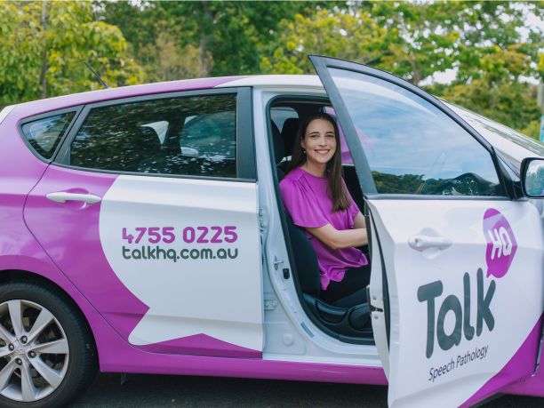 An image of Leah in the work car. 