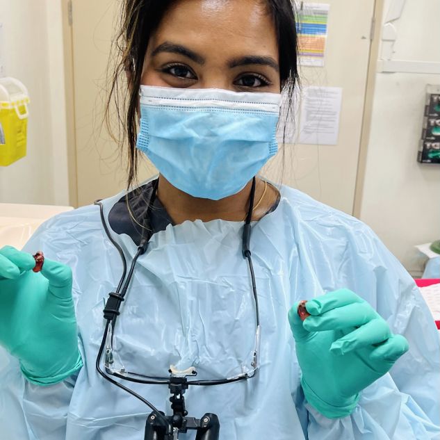 Sowmya in PPE in clinic on placement