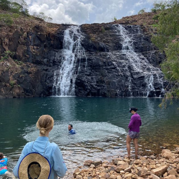 Georgia at a waterfall with friends