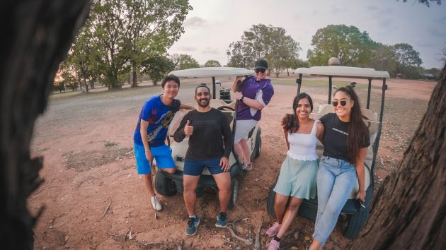 Homya and friends playing golf
