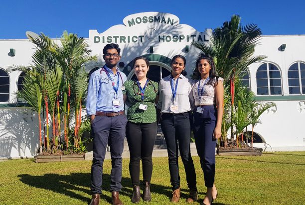 one male and three female medical students standing outside Mossman Hospital